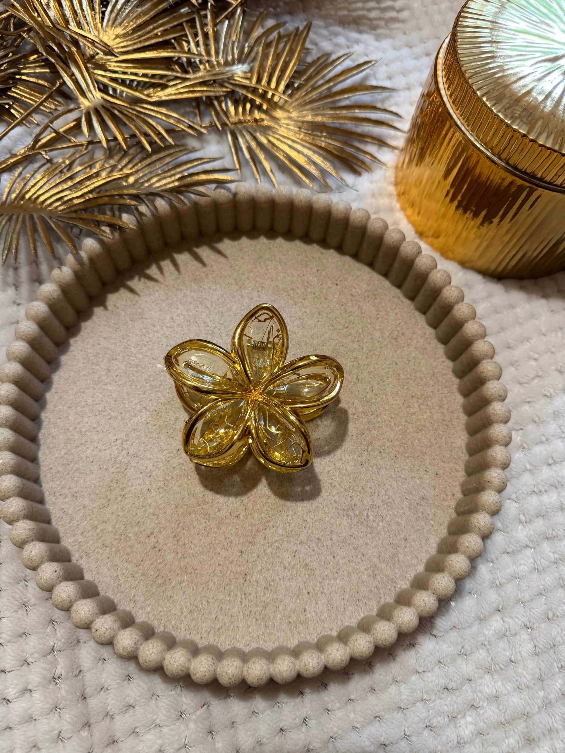 Pince à cheveux fleur dorée