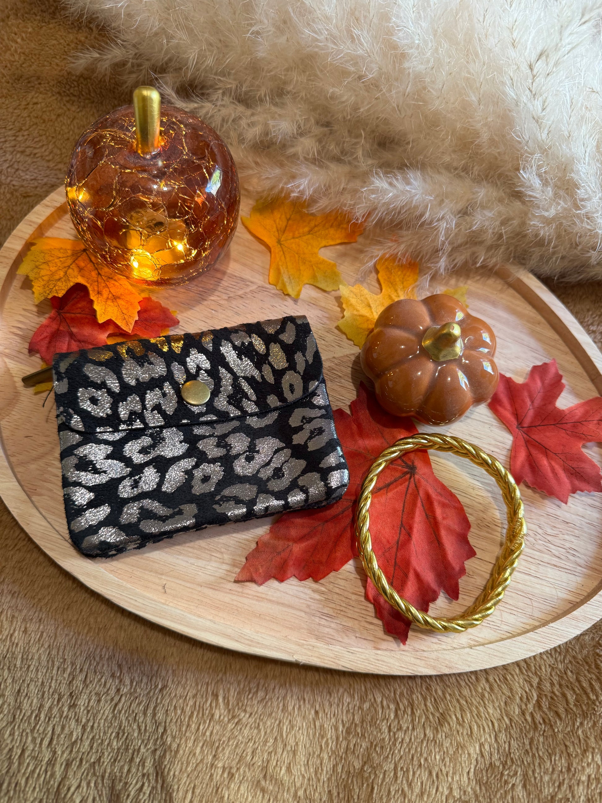 Porte-monnaie léopard en cuir noir