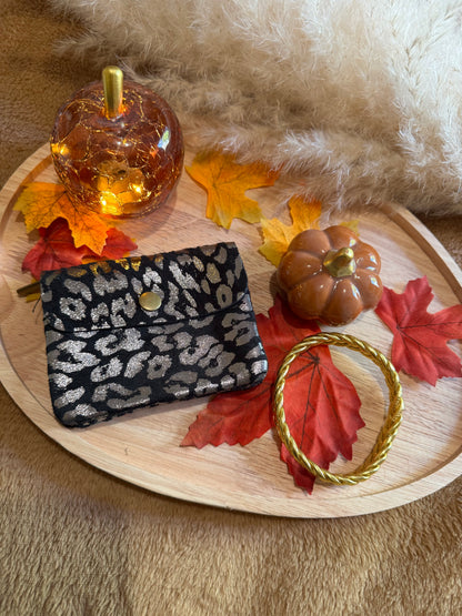 Porte-monnaie léopard en cuir noir